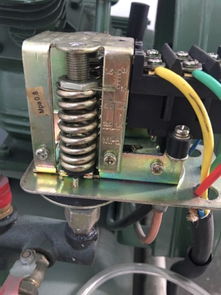 空压机压力升到0.8以上还不会自动停止,该怎么调节,有两个可调节的弹簧,是该旋紧还是旋松